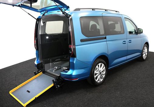 Blue VW Caddy with access ramp deployed